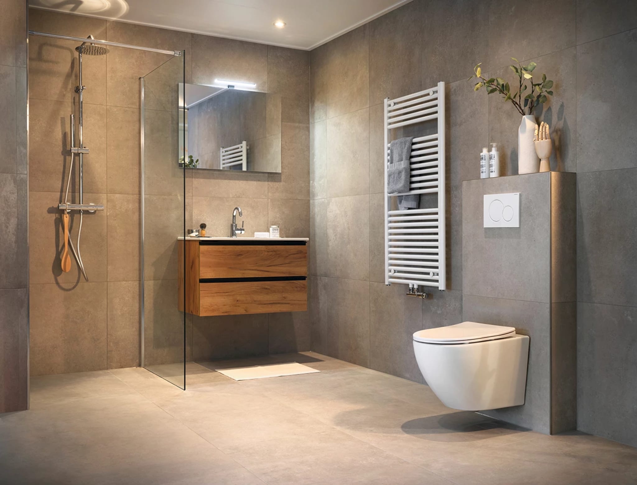 Tijdloze badkamer met zachtgrijze betonlook tegels