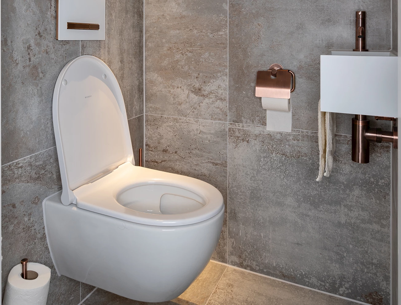 Toilet accessoires koperkleurig