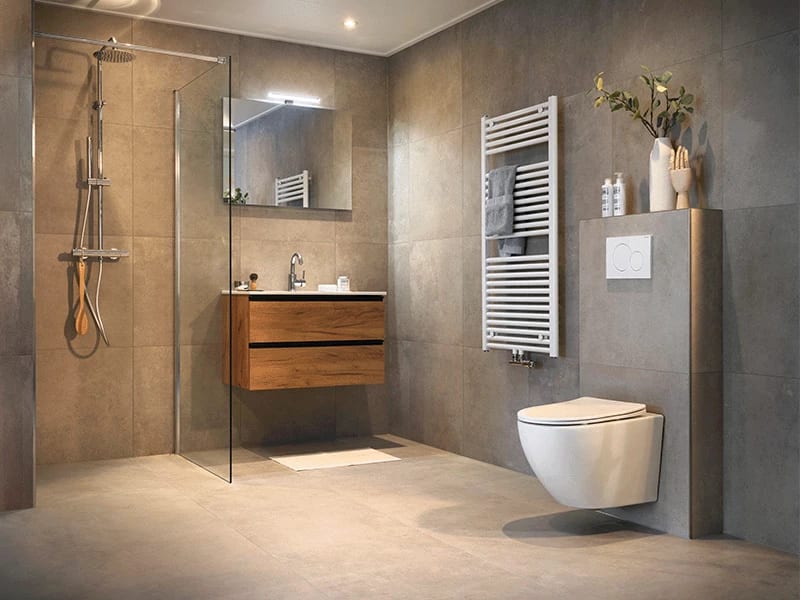 Badkamer in tinten taupe met een houtlook badmeubel, witte radiator en een inloopdouche achter glas